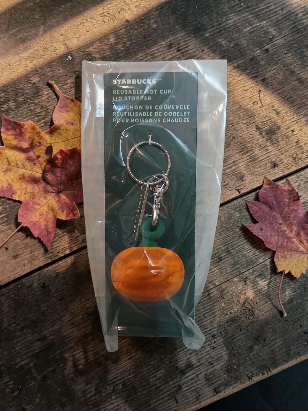 Starbucks Orange Hot Cup Lid Stopper Keychain with Green Accent